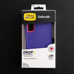 Estuche de protección OtterBox Defender para Samsung S23 Plus en morado y rosado.