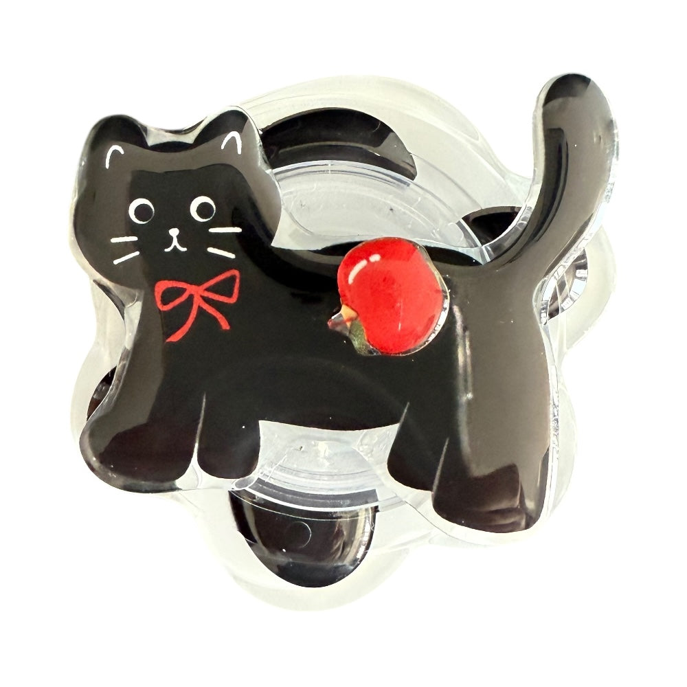 Gadget pop grip con diseño de bruja y gato negro, soporte magnético circular.