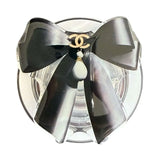 Gadget Pop Grip Magsafe Circular Mo–o Chanel with stylish black bow design.