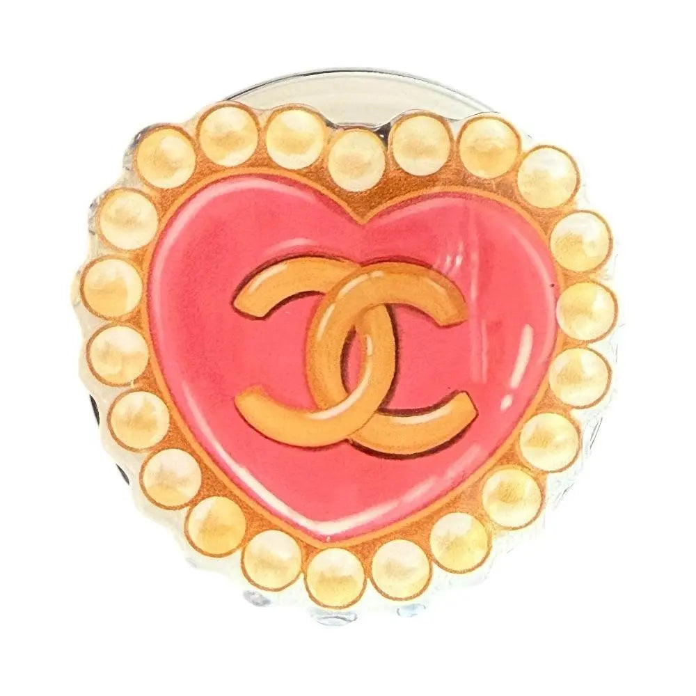 Gadget Pop Grip Magsafe Circular Chanel Perlas with pearl accents and heart design.