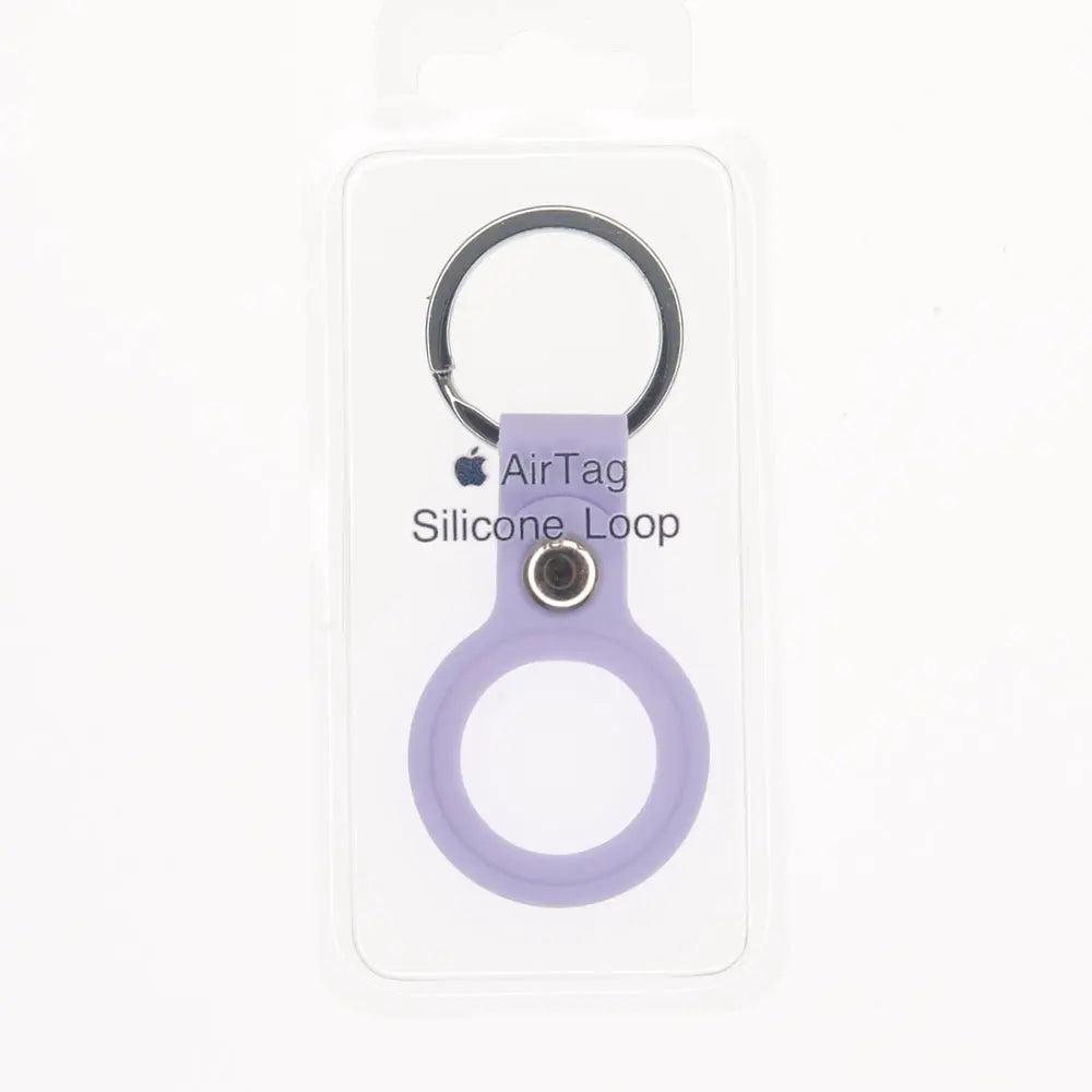 Estuche de silicona morado ambolado para AirTag Apple.