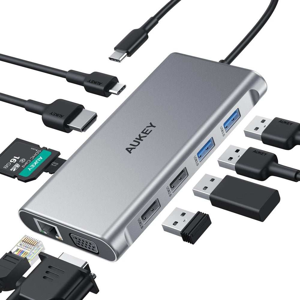 Adaptador Aukey Hub 10 en 1 con USB-C, HDMI 4K y VGA, color plateado, diseño moderno y portátil.